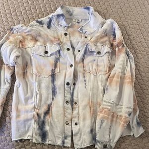 Light weight cotton jacket …textured with different patterns throughout-